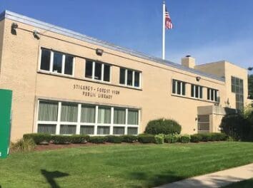 Public library exterior with flagpole
