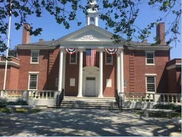 Red brick municipal building with columns
