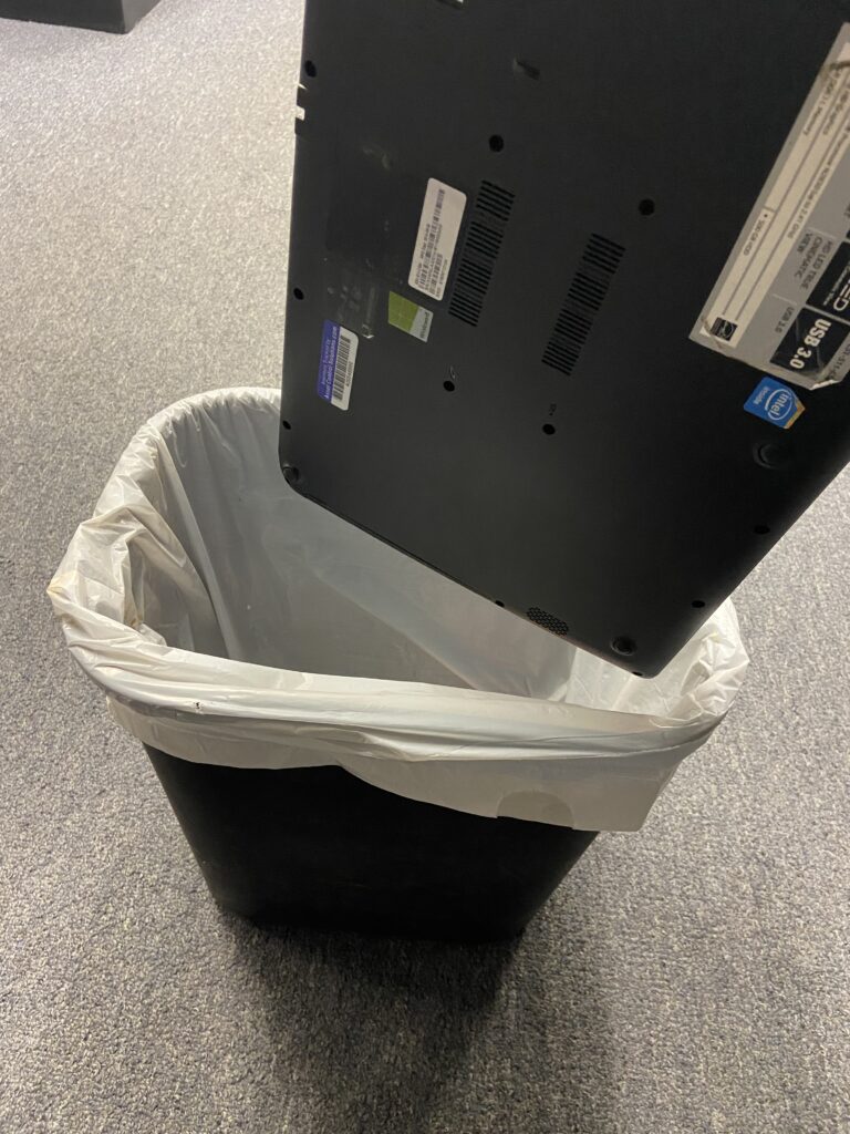 closeup shot of a dustbin and a device